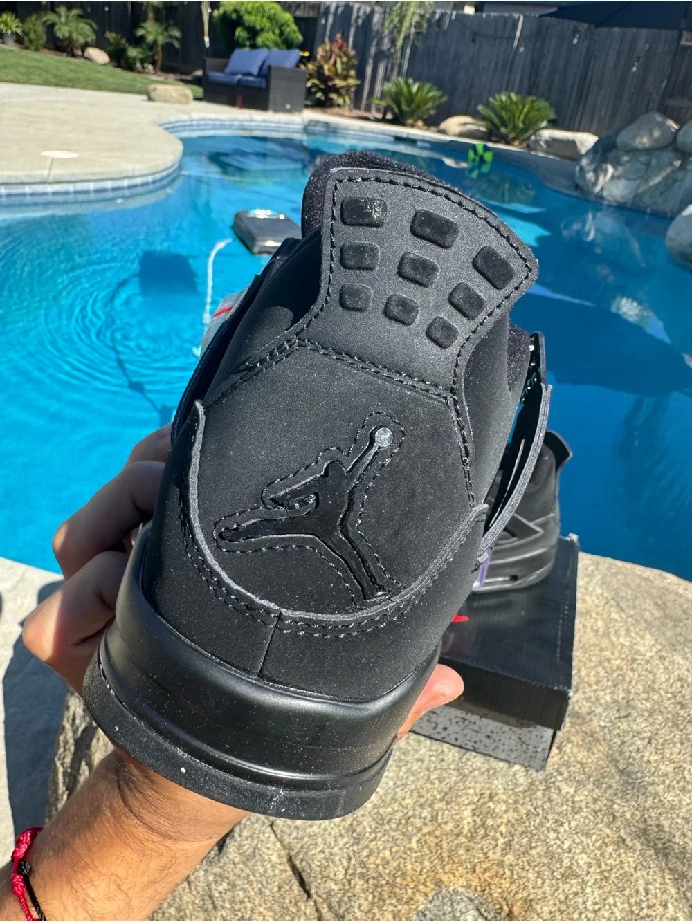 Jordan Men's Black Retro Sneakers with Subtle Red Accent